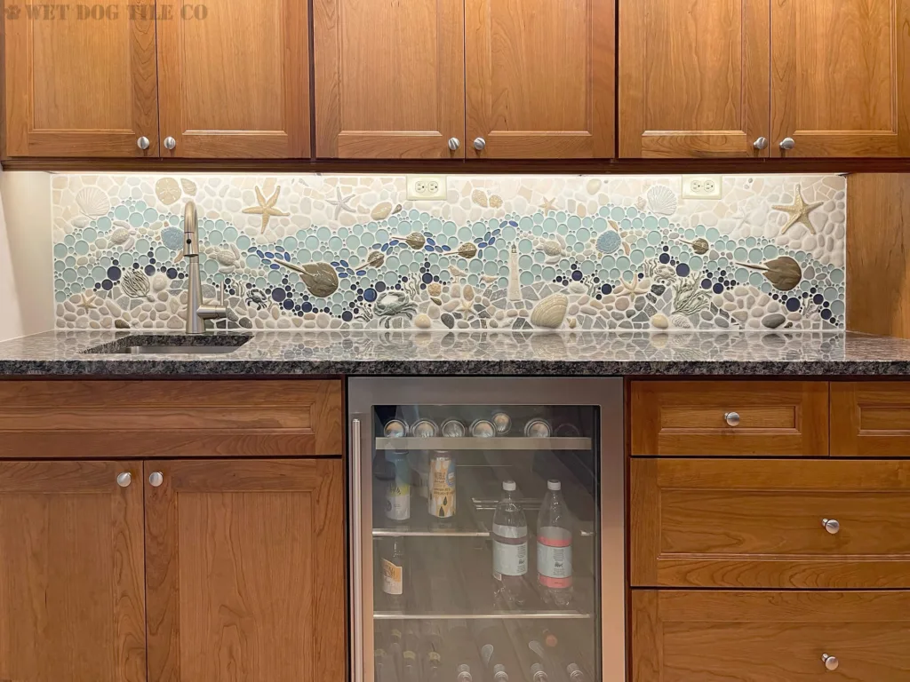 Mosaic tile wet bar backsplash with handmade lighthouse tile